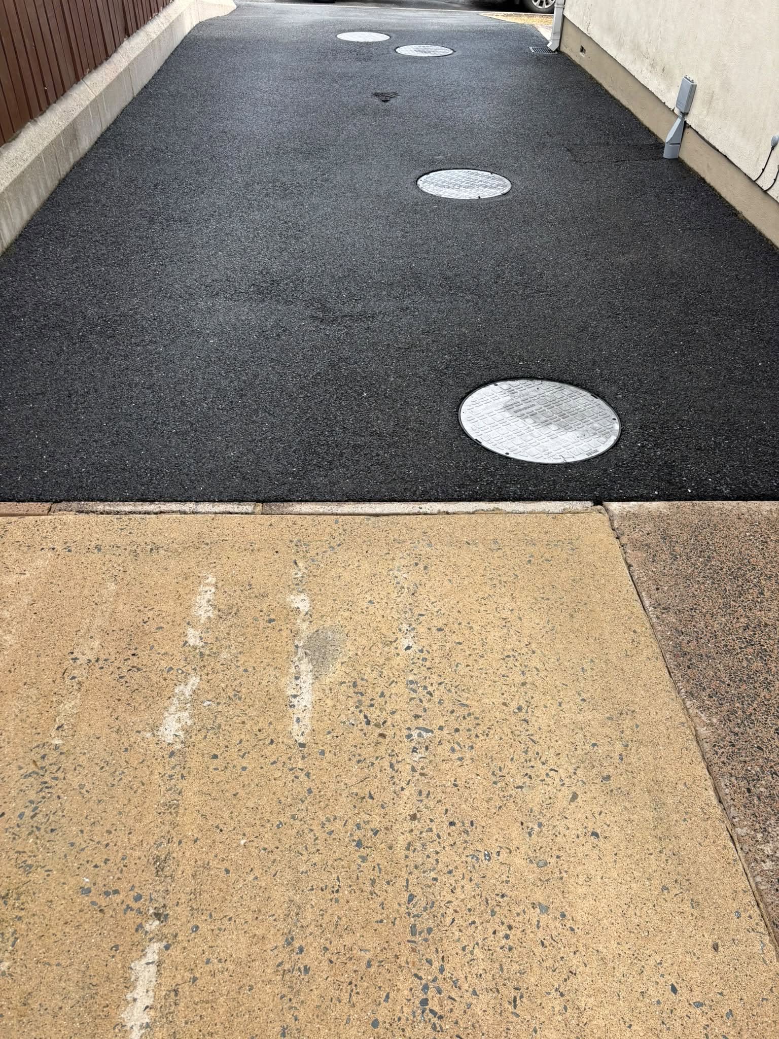 Driveway before and after power washing